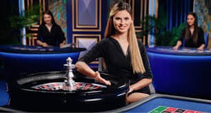 Antar muka Push Gaming di aplikasi mobile ajo 89 menampilkan meja dealer langsung dengan multi-kamera